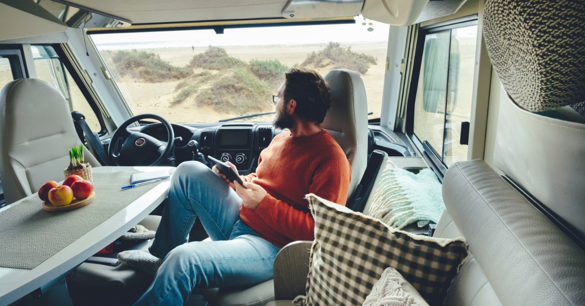 man in RV relaxing 