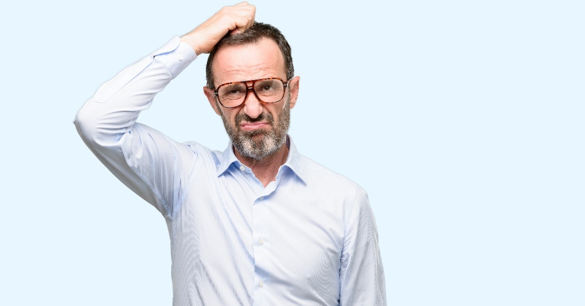 middle age man with glasses doubt expression