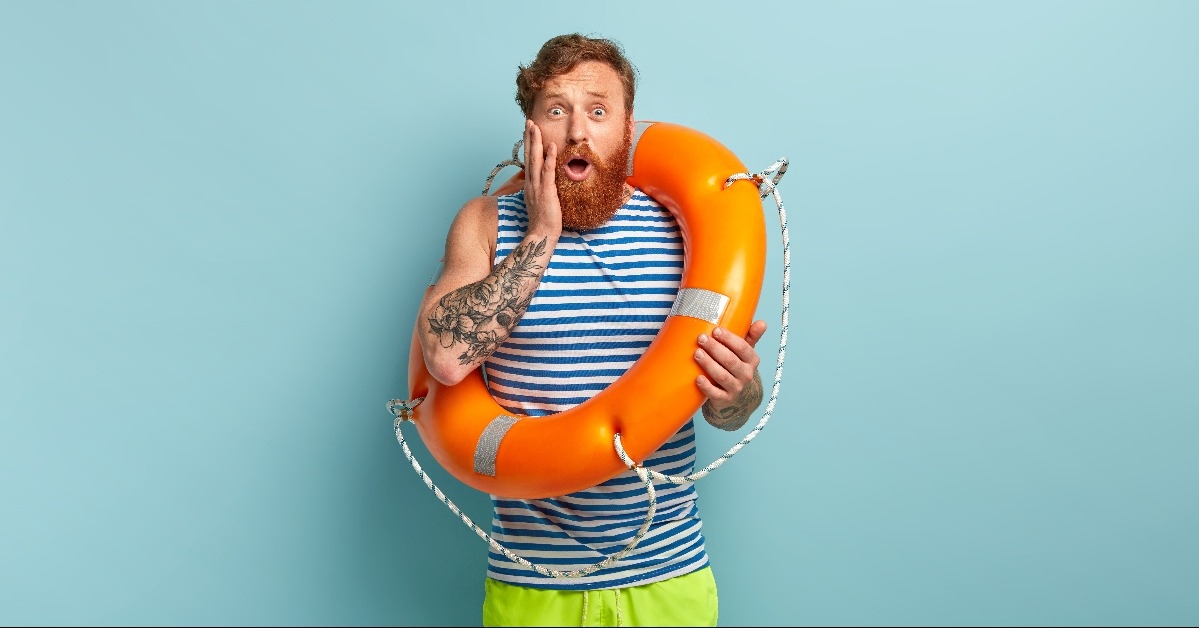 redhaired man has nervous facial expression