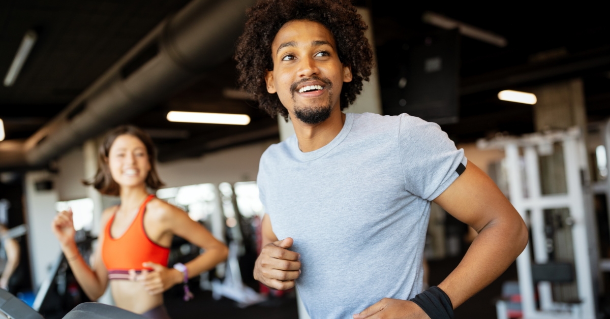 people running on treadmill in a gym