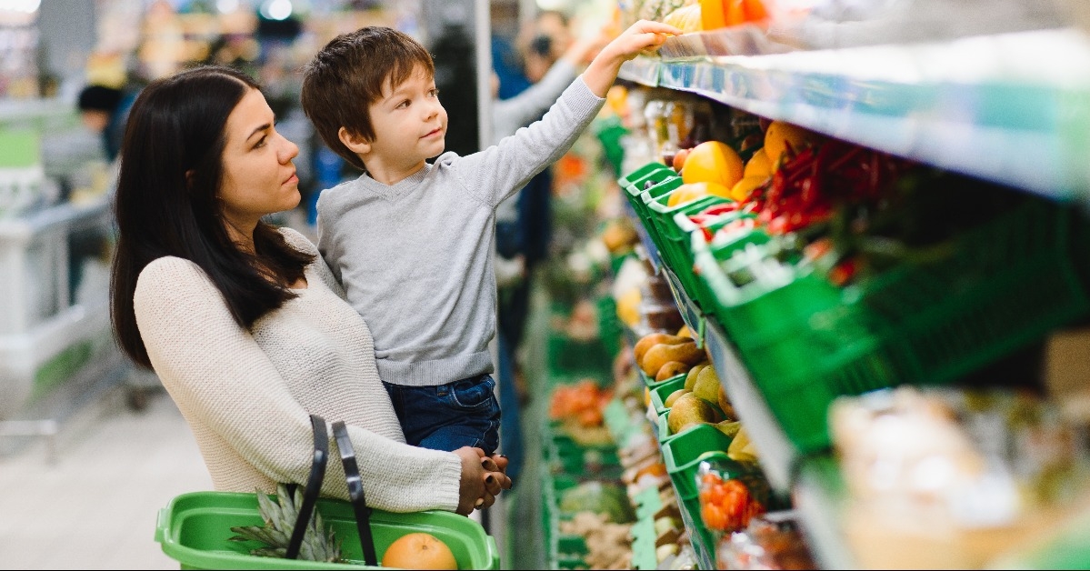 mother with her little baby boy at the supermarket