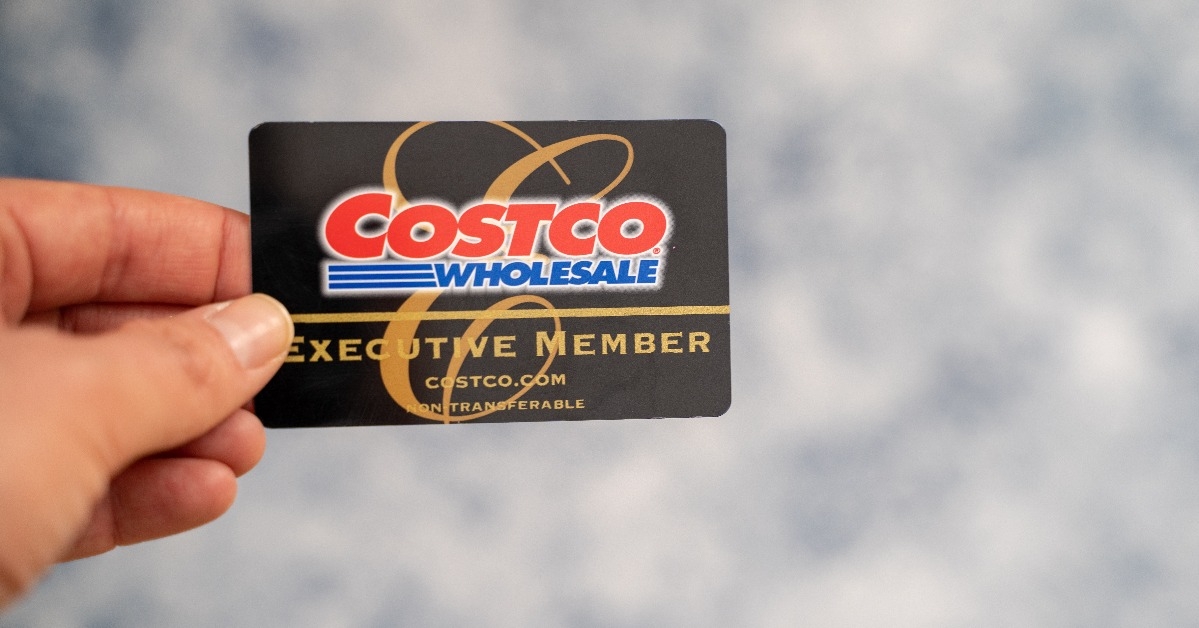 hand holding a Costco Wholesale Executive Membership card