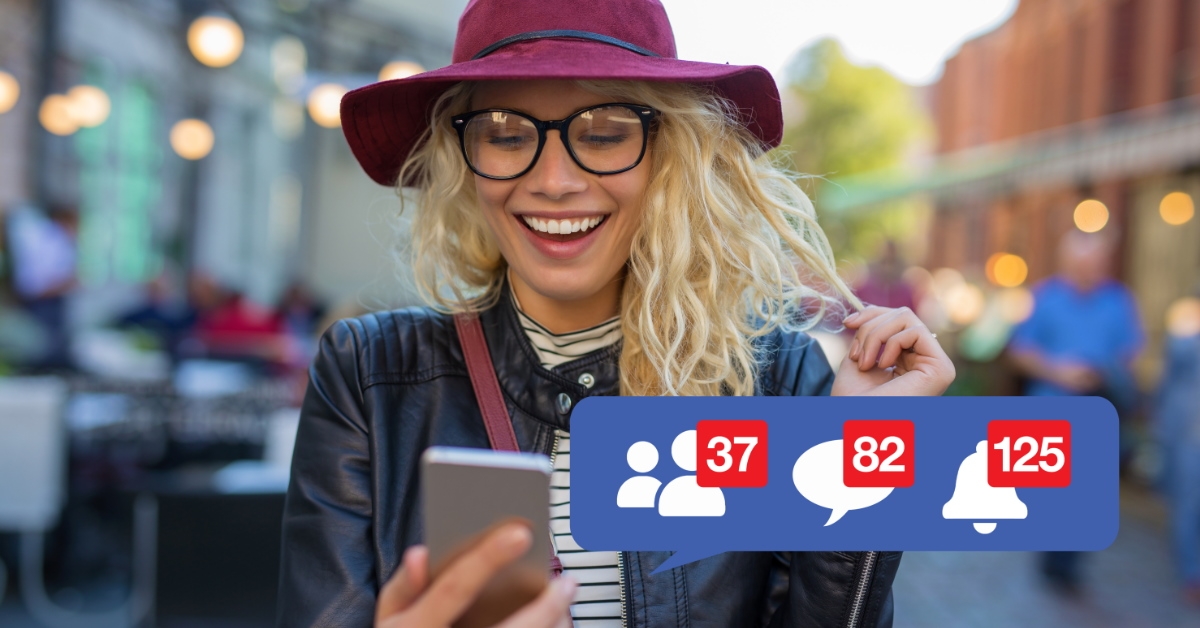  happy woman checking social media notifications