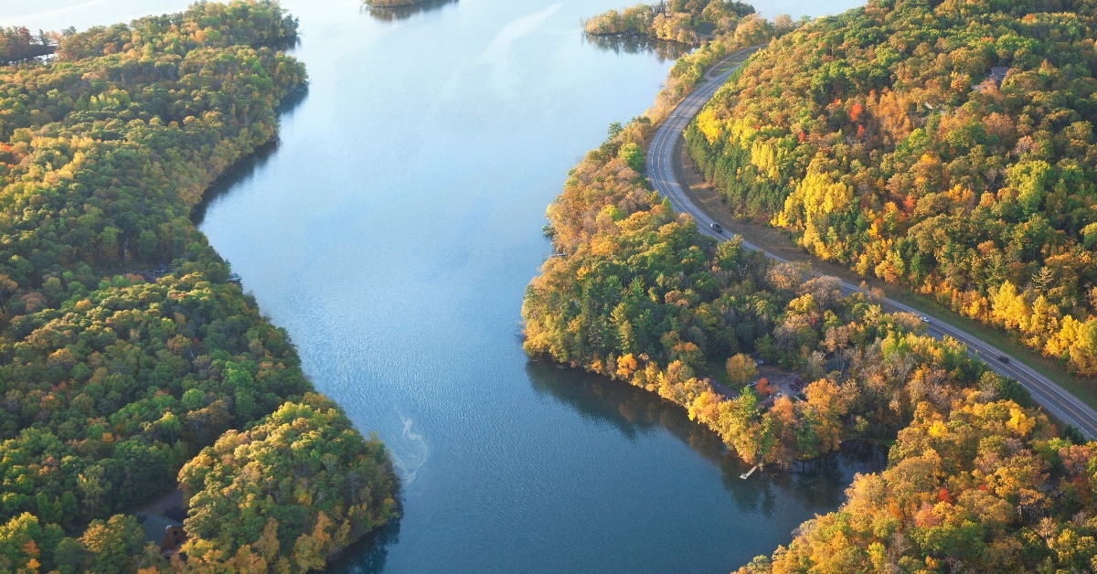 curving road along Mississippi River during autumn