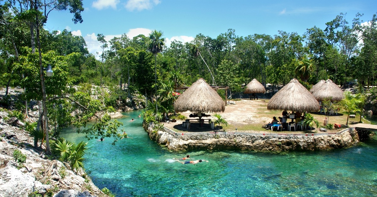 Cenote with crystal clear blue waters
