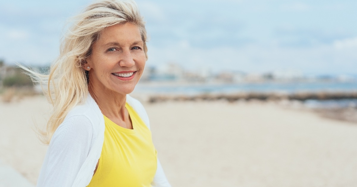 smiling woman at the beach