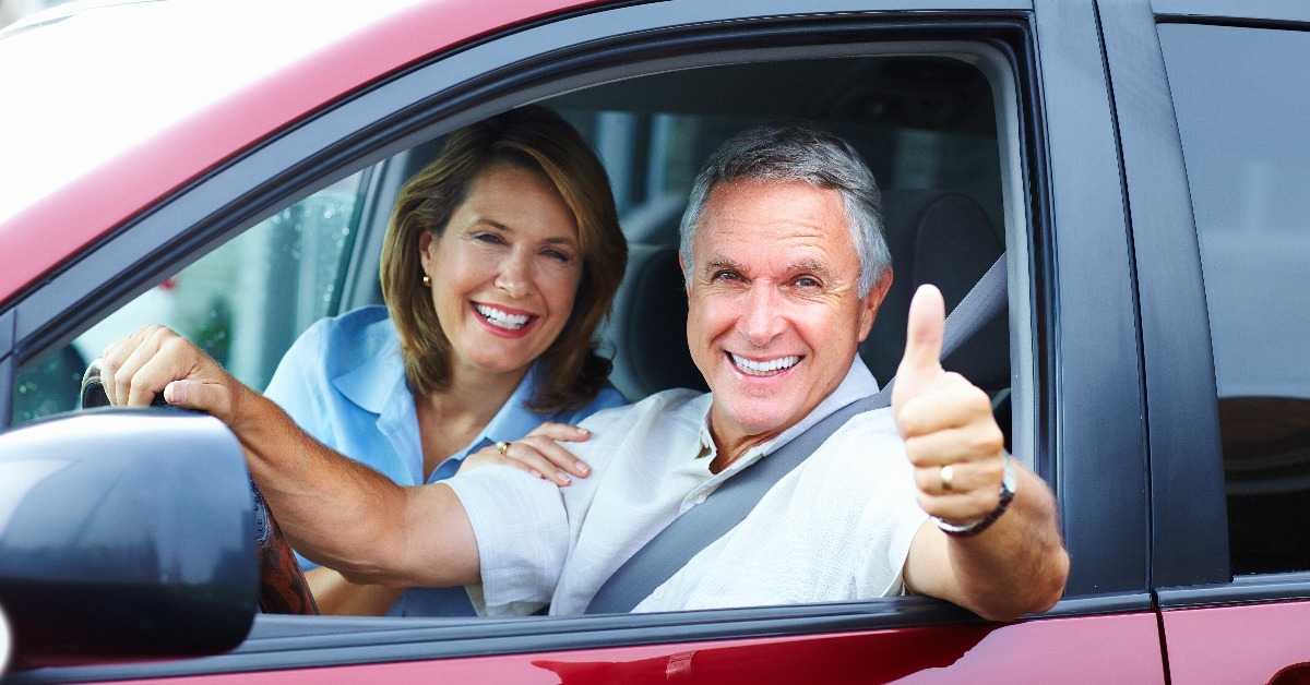 senior couple in the car