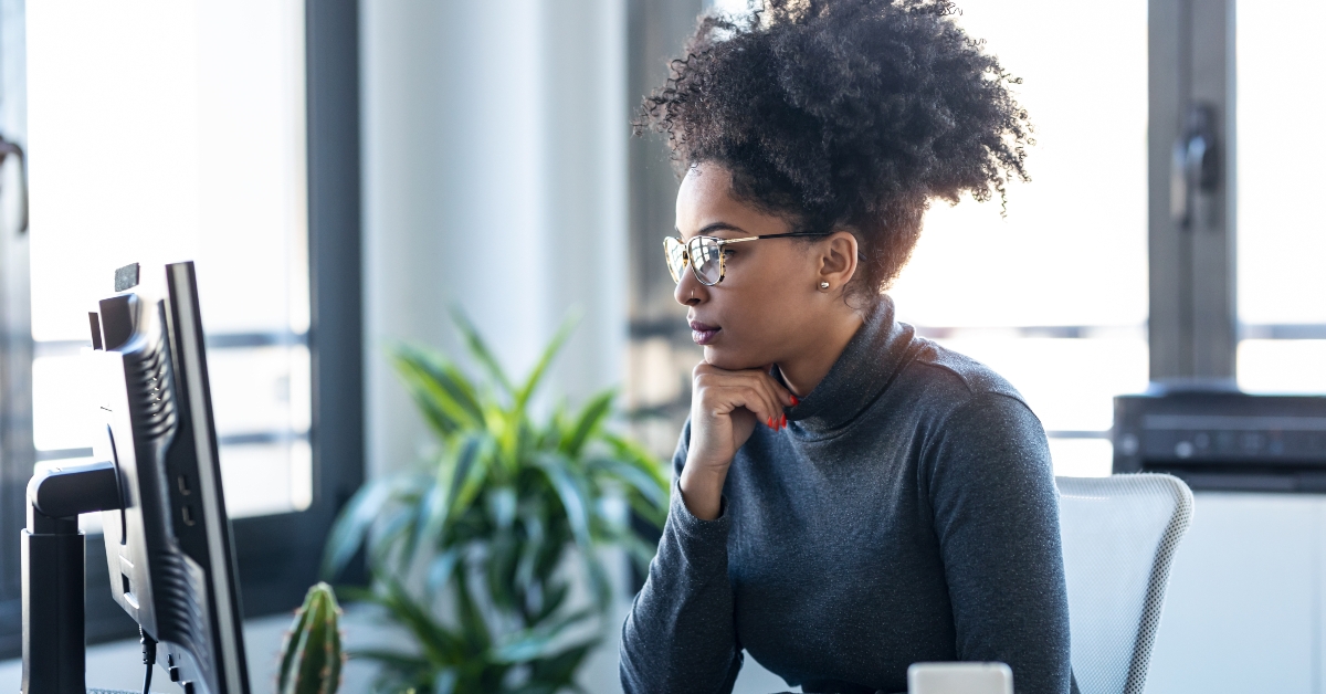 woman working while making video call with computer