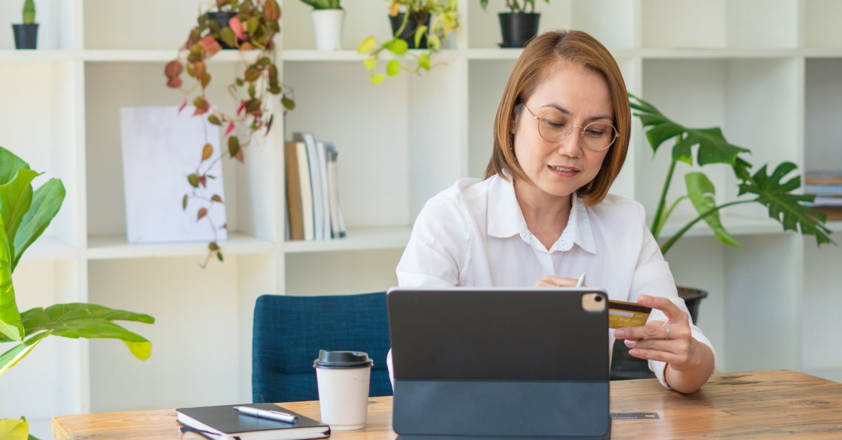 female accountant wearing eyewear working from home