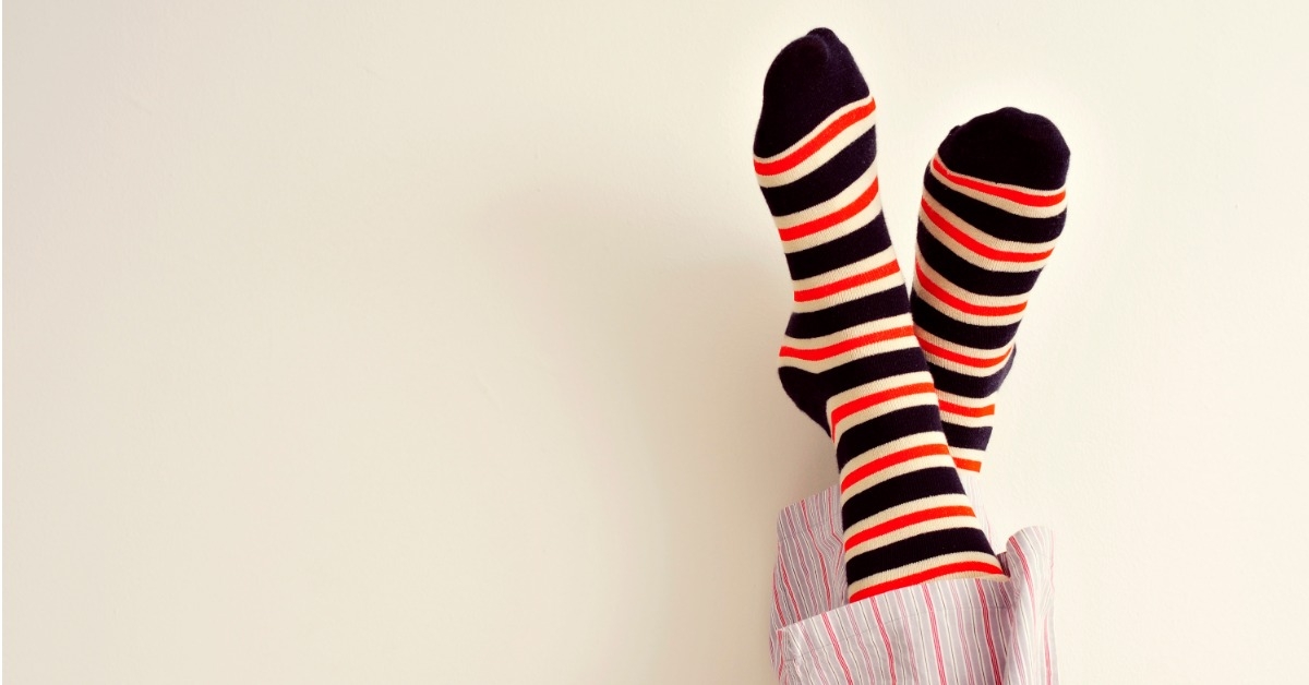 shot of feets wearing pajamas and socks