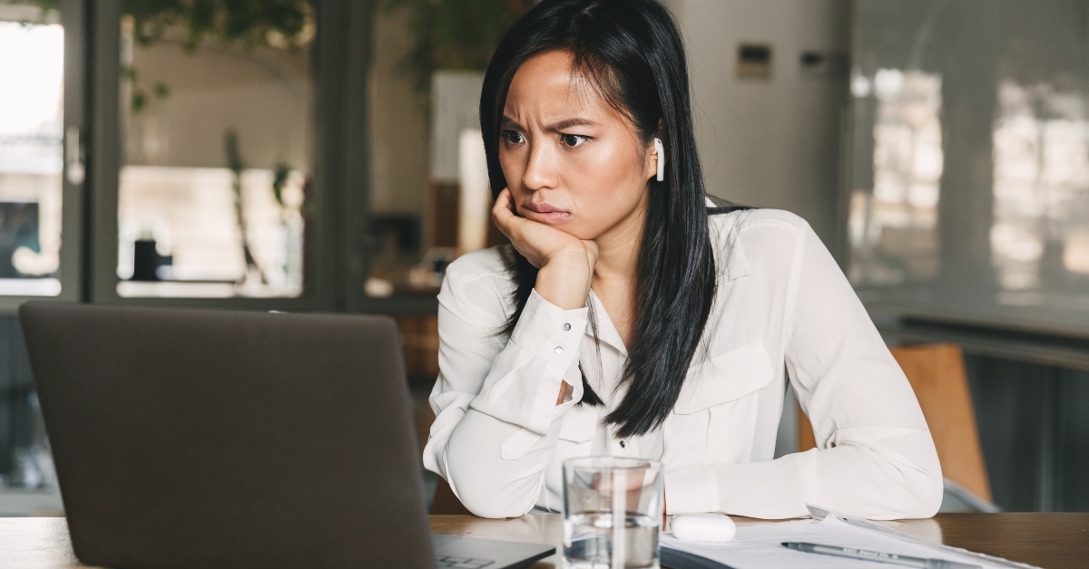 woman wearing white shirt and bluetooth earphones