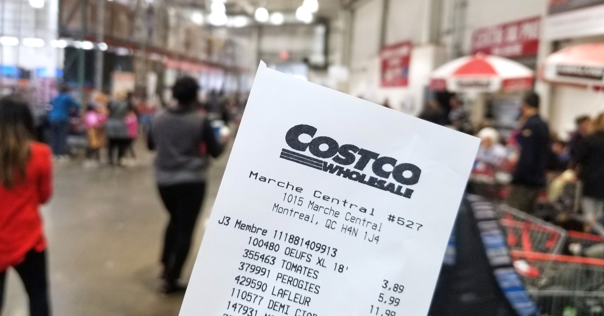 hand holding Costco receipt