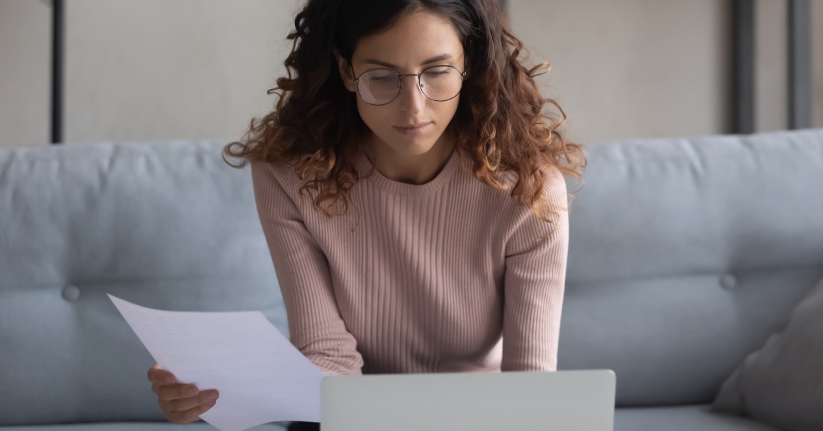 woman checking papers