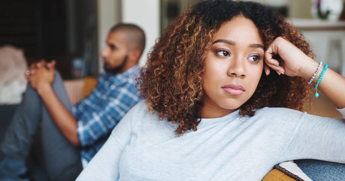 unhappy african american couple at home