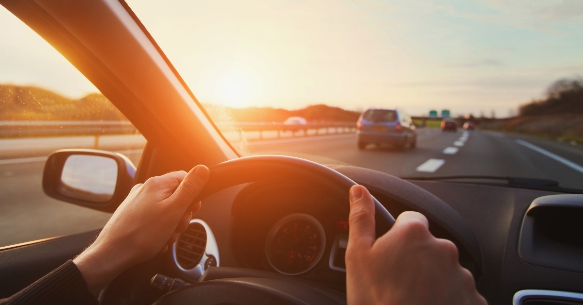 car driver on steering wheel