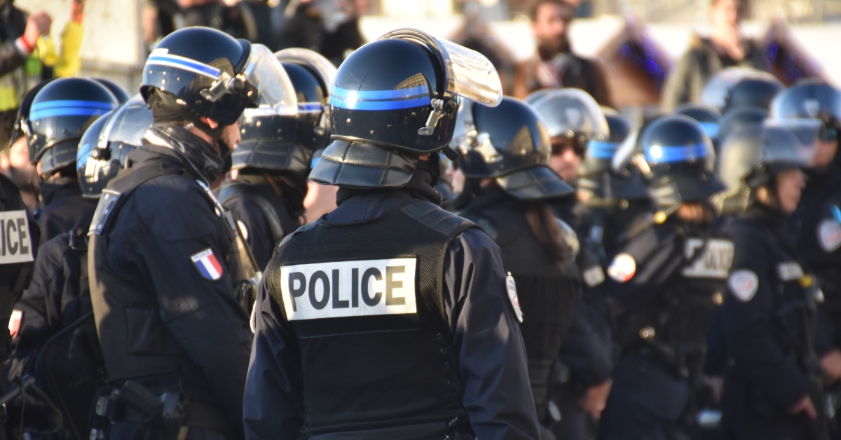 police officers photographed from behind during a protest