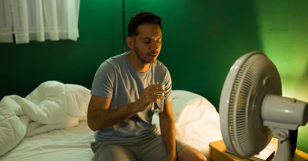 thirsty man drinking water at midnight