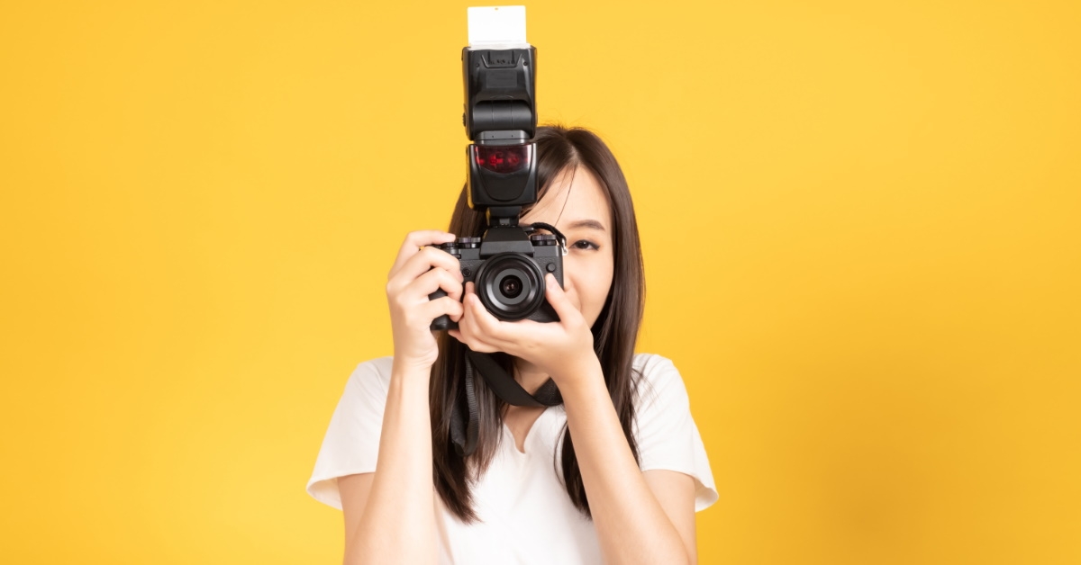 woman taking pictures with professional camera