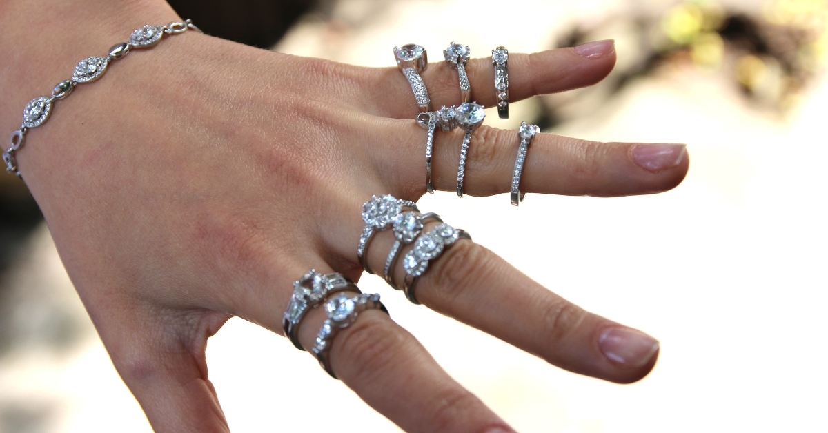 woman wearing shiny rings