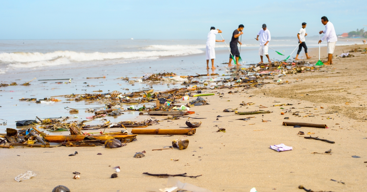 cleaning beach people ocean Bali