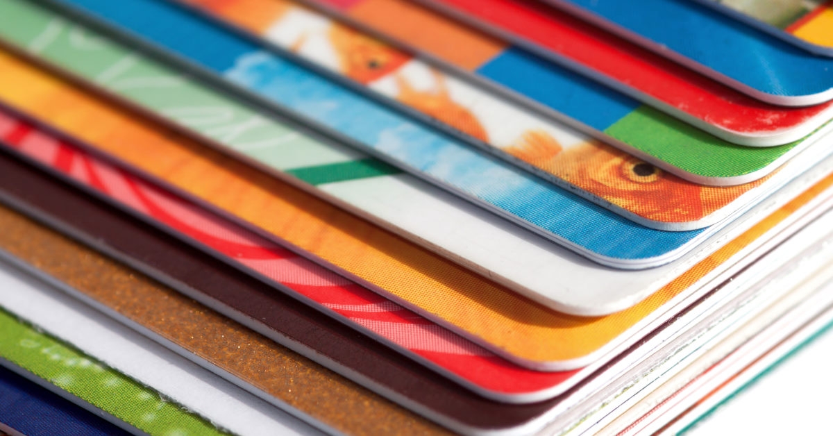 bunch of colorful cards on white background