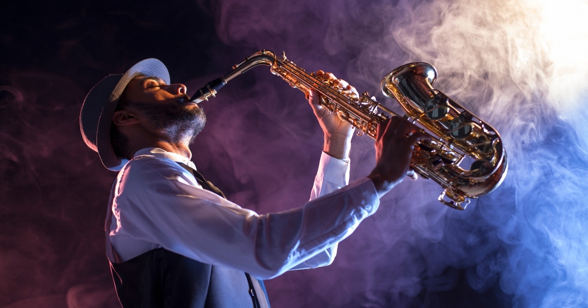 artist playing saxophone