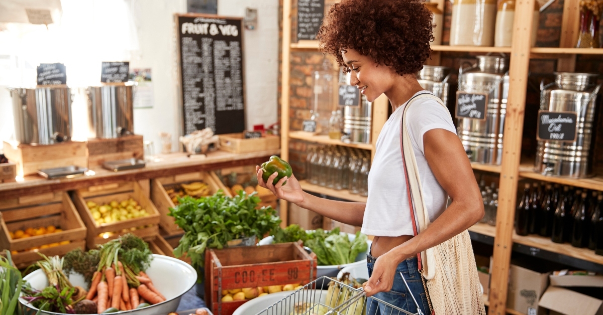 woman buying fresh fruit and vegetables