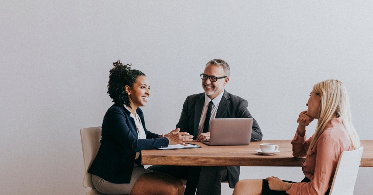businesspeople brainstorming in a meeting