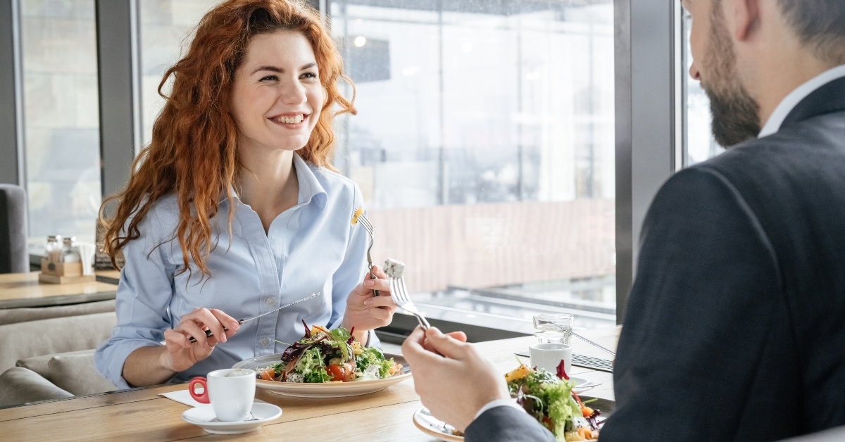 businesspeople having business lunch at restaurant