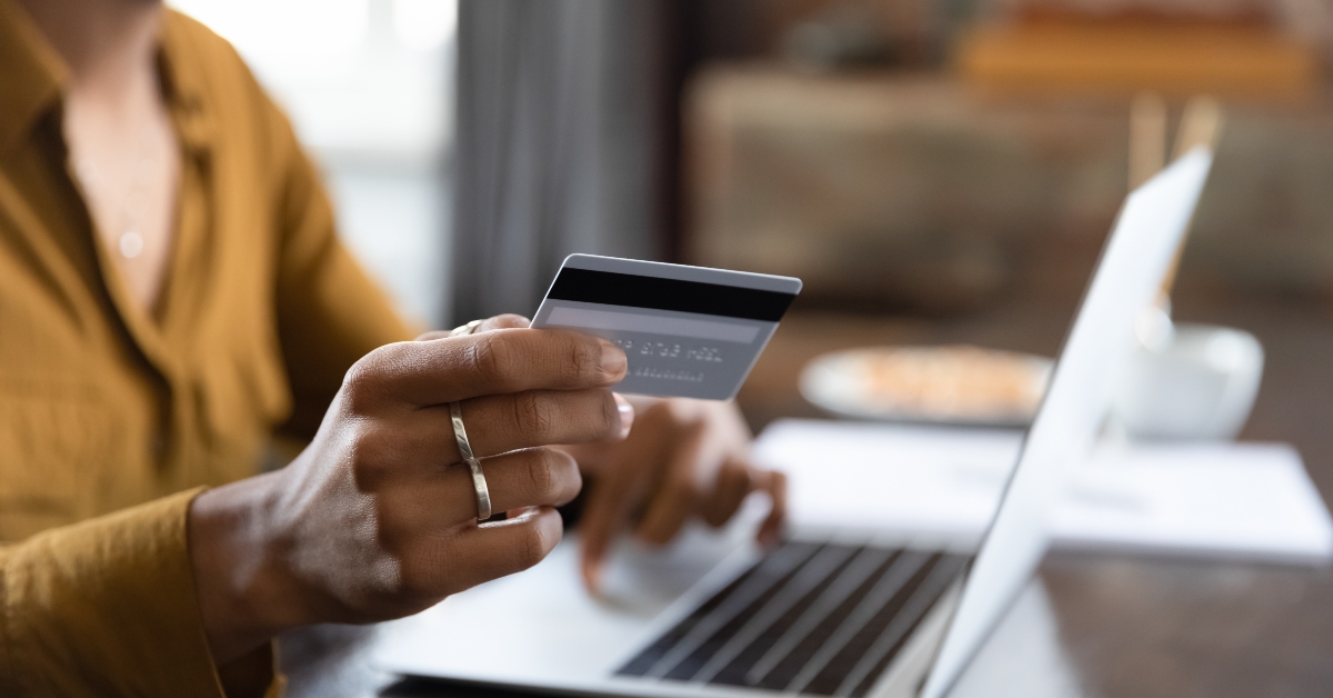 woman making payment for purchase on internet
