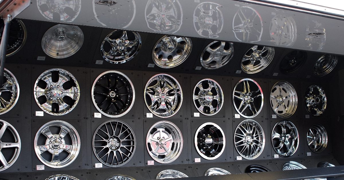 number of chrome hubcaps at display in workshop