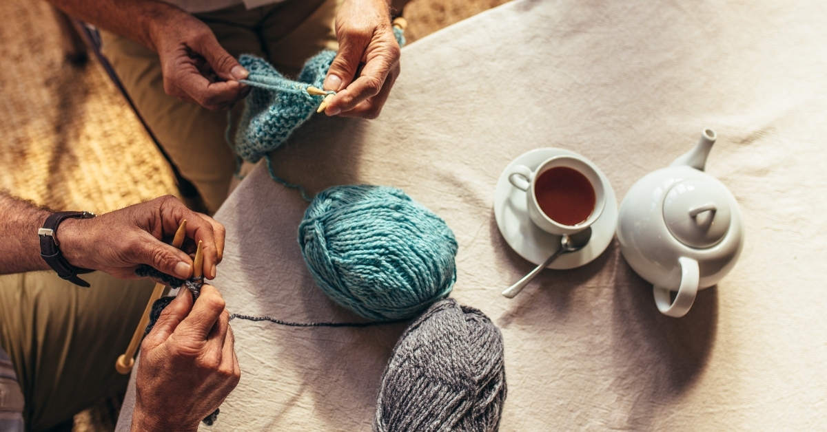 senior people knitting at home