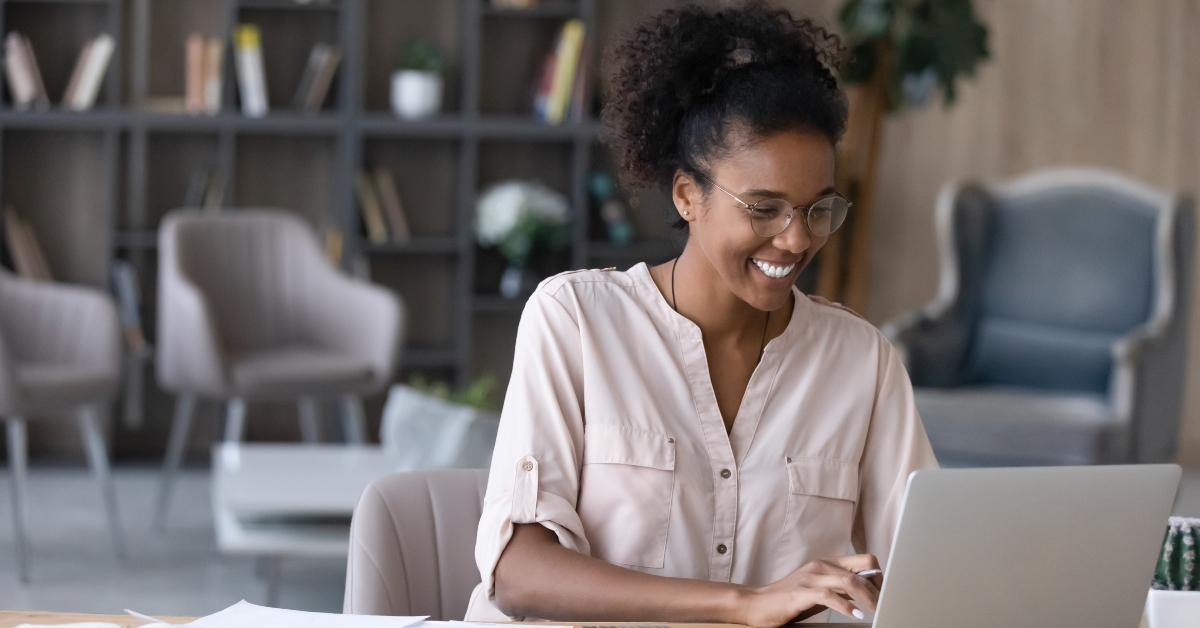 woman manages household budgets on laptop