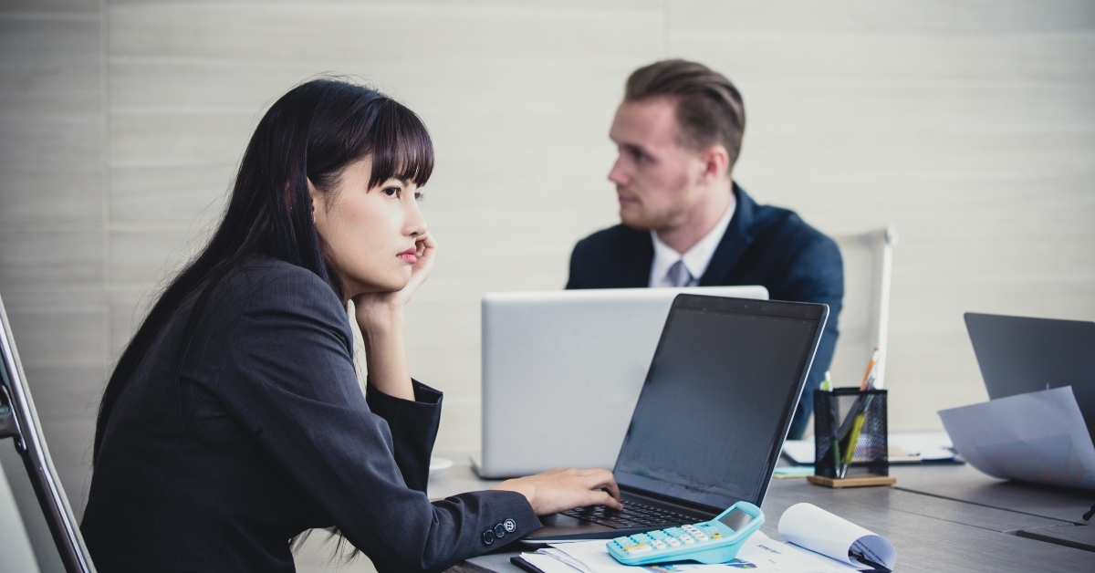 businesswoman feeling bored with meeting