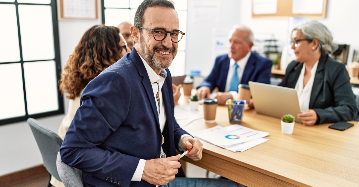 middle-aged business workers working at the office