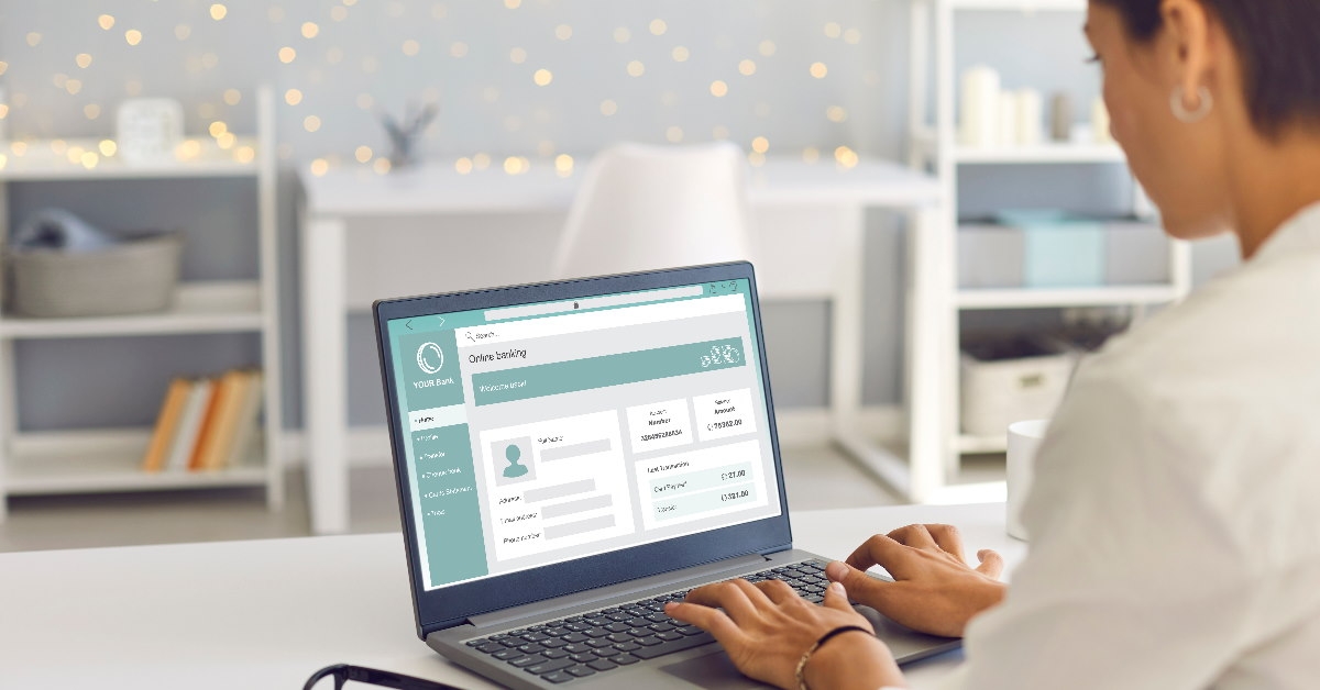 woman using laptop to check online banking portal 