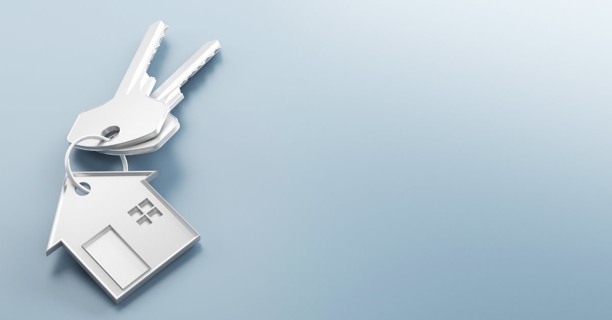 silver color keys with house keychain