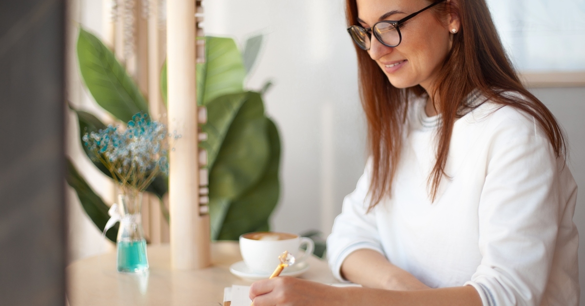 businesswoman in eyeglasses planning