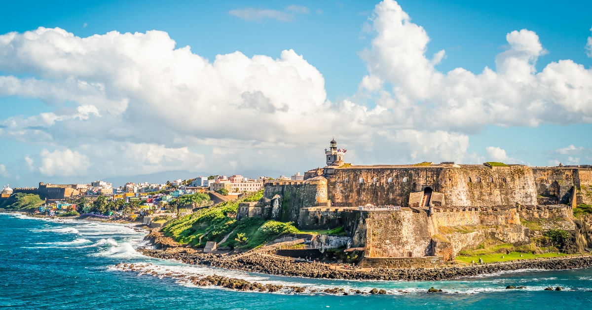 castle el morro on coastline with blue water waves in puerto rico