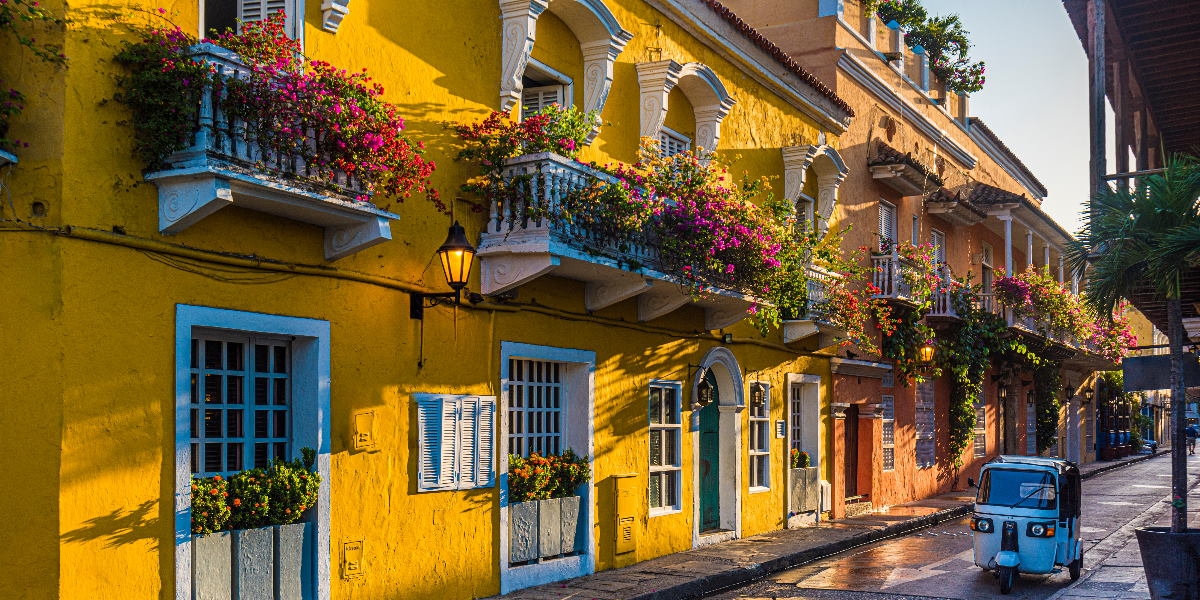 beautiful and colorful houses with flowers in balconies in streets of cartagena colombia