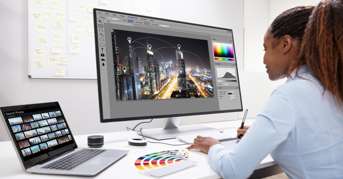 designer editing photos on computer