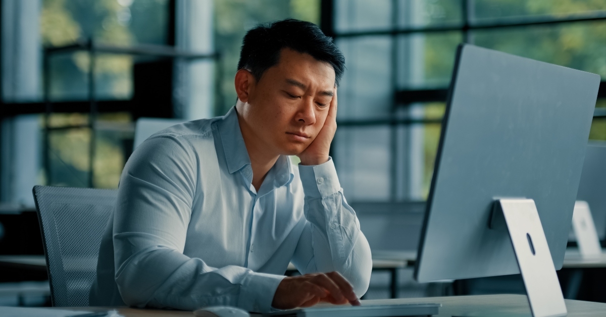 japanese man exhausted and tired