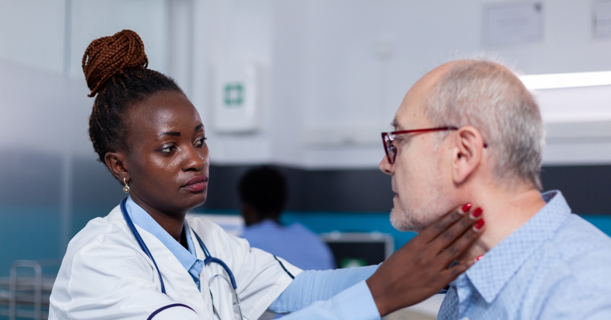 doctor checking on senior patient