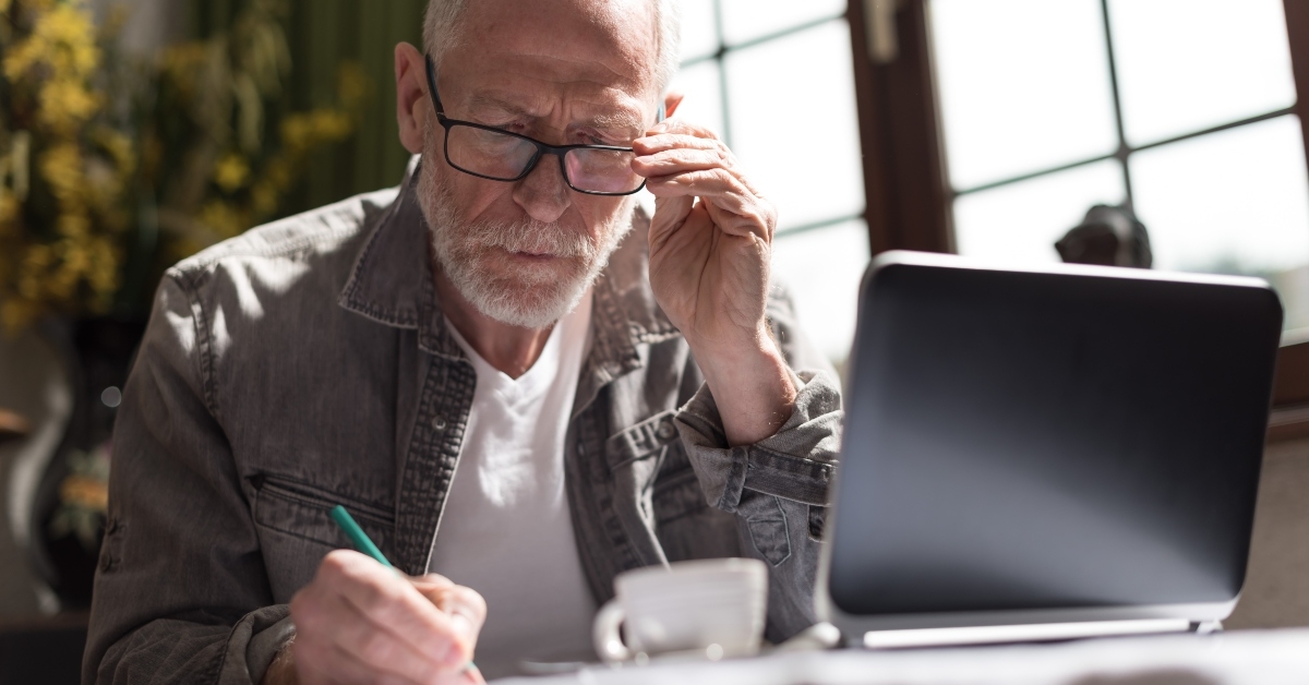 senior businessman working at home
