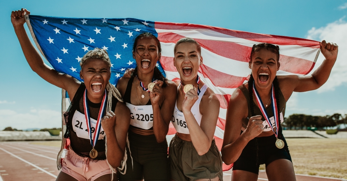 athletes celebrating winning gold