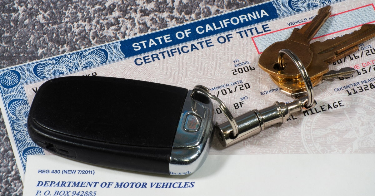 california automobile certificate with car keys on it