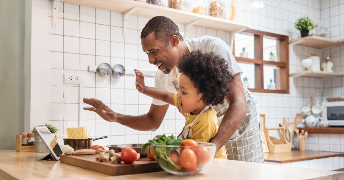 father and son make video call with digital tablet