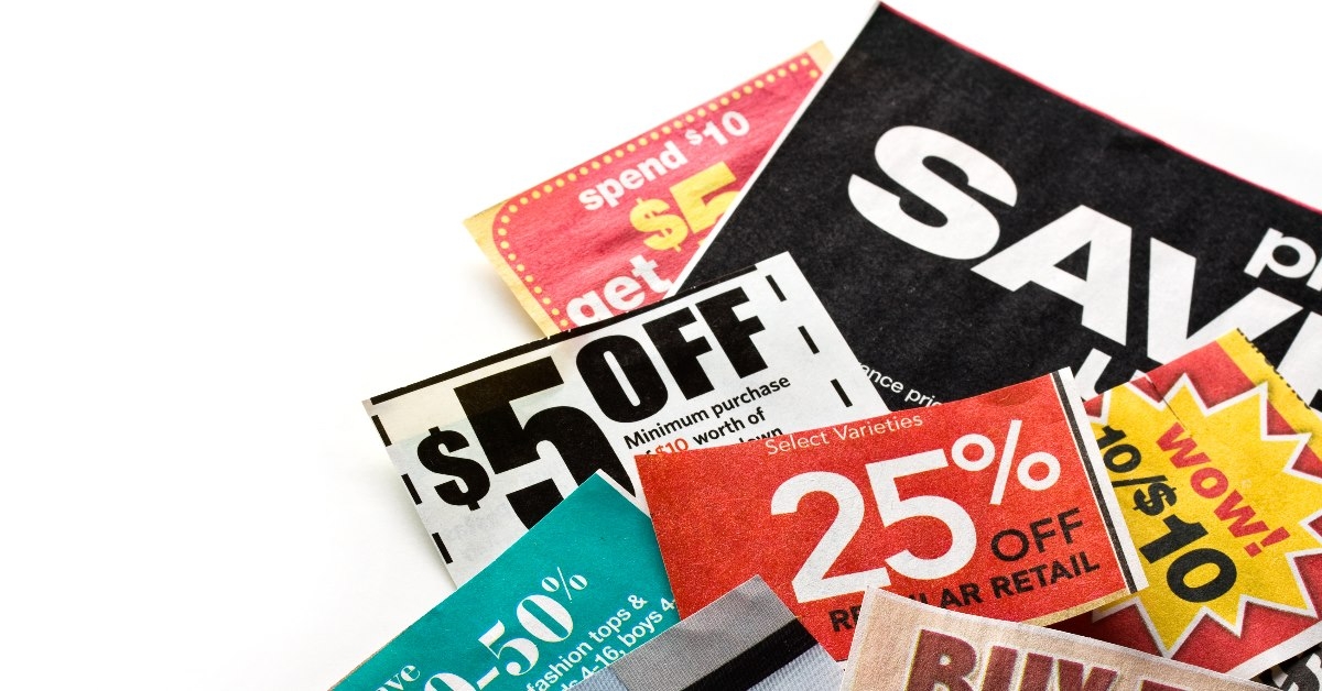 discount coupons scattered on white background 