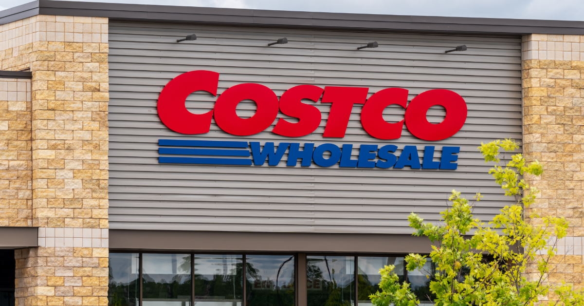 costco wholesale logo outside costco store during day time with clear sky
