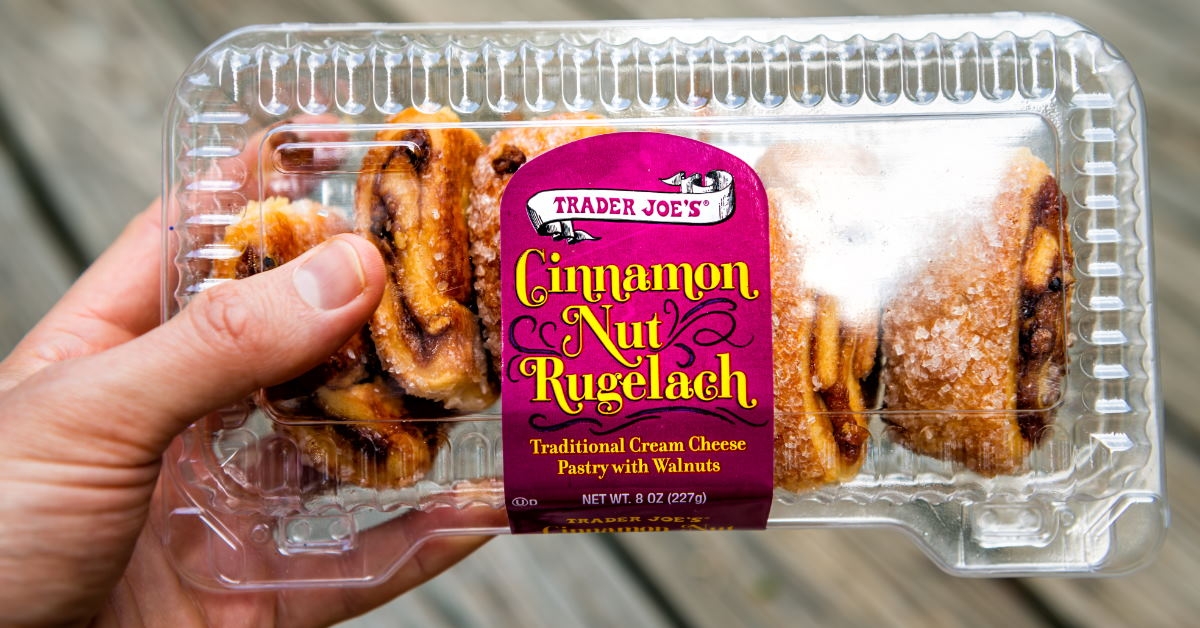 hand holding cinnamon nut rugelach pack of trader joes 